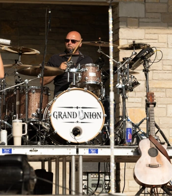 a man playing a drum set