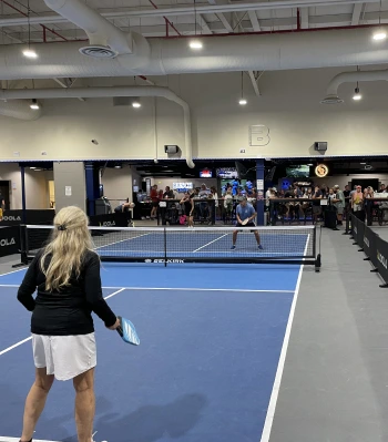 pickleball players on a pickleball court